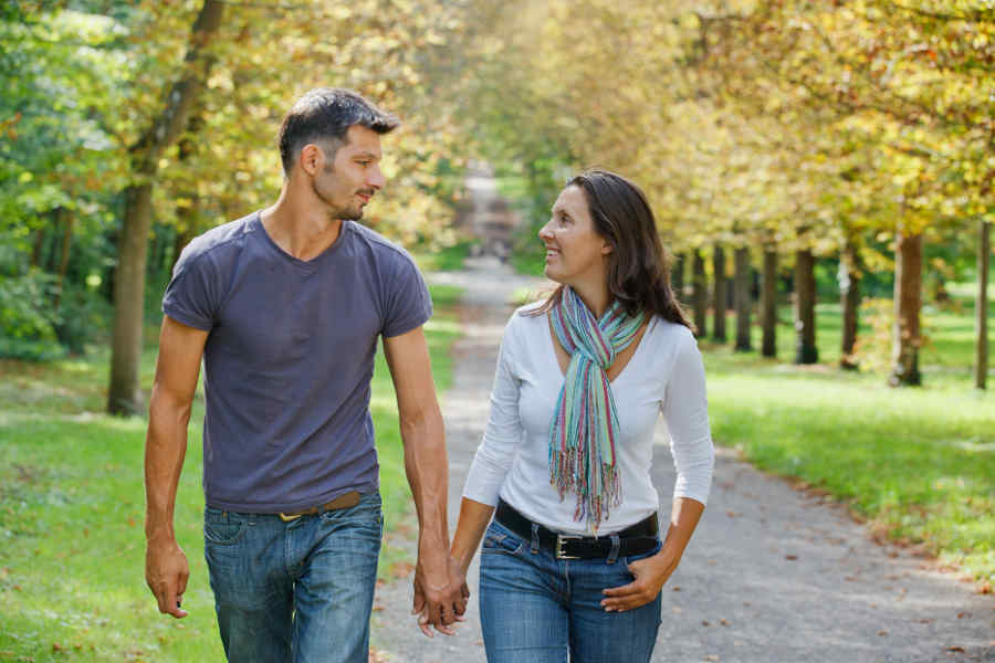 Young-couple-walking-through-a-forest-in-North-Vancouver-2.jpg