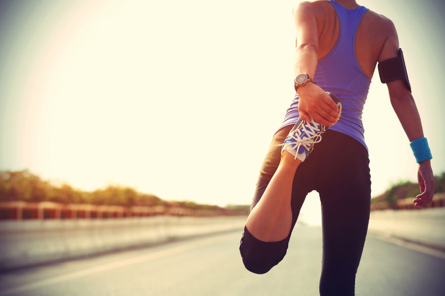 Woman-runner-stretching-legs-before-going-for-a-run-in-North-Vancouver-2.jpg